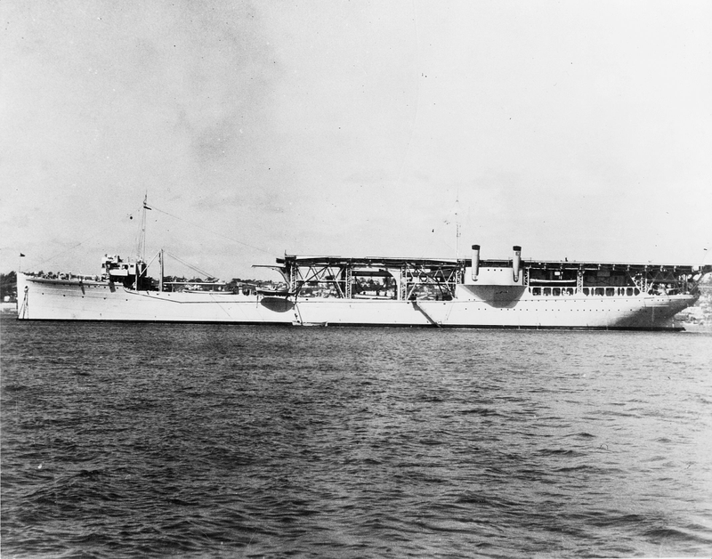 The ships exhaust stacks/funnel were able to be lowered for flight operations... it was a coal burning carrier and thus had somewhat less smoke than the Russian flagship Admiral Kustenov does in 2017..J/K... kinda of...
